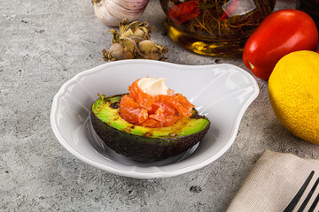 Whole grilled avocado with salmon