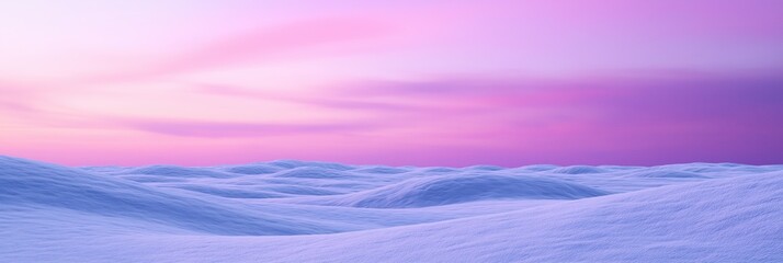 Landscape photograph of a snowy mountain range. the sky is a gradient of pink and purple, with the pink on the top and the purple on the bottom.