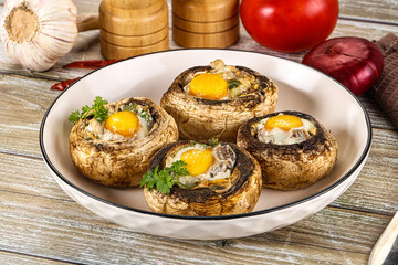Baked champignon with quail egg