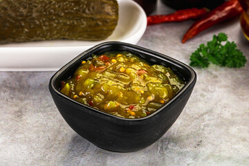 Souce gherkin relish with marinated cucumbers