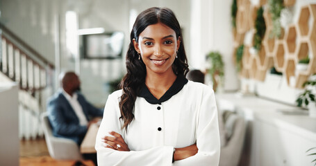 Portrait, arms crossed and happy business woman in office as sustainability manager with pride. Coworking, confidence or professional worker in meeting, eco consultant or environmental policy advisor