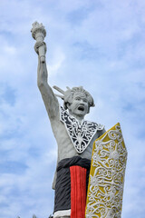 A welcome statue in the form of a Dayak man from Balikpapan city