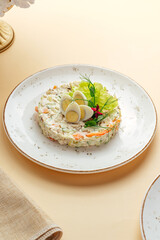Olivier salad with quail eggs