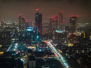 Sunset Over Manchester Cityscape and Urban Skyline