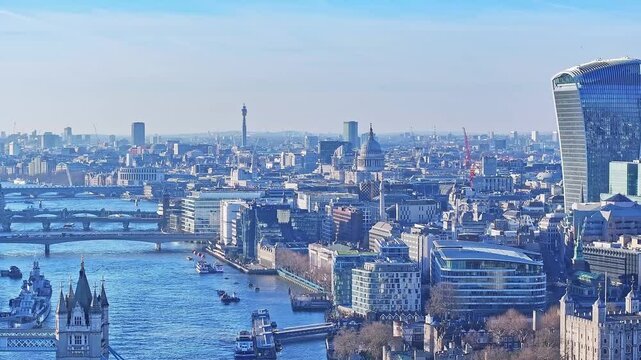 Aerial drone shot showing a cityscape of London; with St Pauls Cathedral, Walkie Talkie Building and BT tower in view. London, United Kingdom