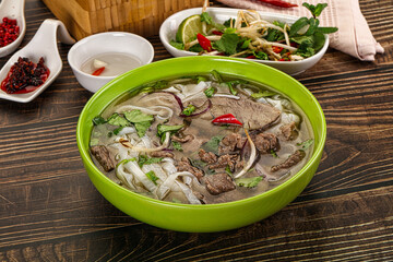 Vietnamese Pho Bo soup with beef and noodles