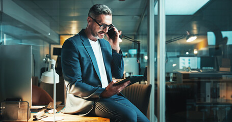 Mature man, tablet and phone call with office, overtime work or project feedback. Web design, night...