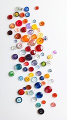 Colorful Buttons Scattered on White Background: A vibrant display of assorted buttons in various colors and sizes, creating a playful and artistic composition.
