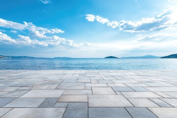 Seaside paved walkway, tranquil ocean view, sunny sky, empty space