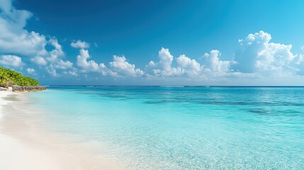 Fototapeta premium Tropical beach with clear blue water and white sand, embodying serene simplicity. 