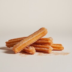 Crispy sugary churros on light background highlighting texture and sweetness