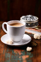 Cup of coffee on wooden background. Soft focus. Copy space	