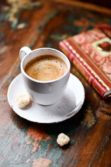 Cup of coffee on wooden background. Soft focus. Copy space
