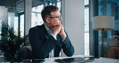 Business, thinking and man in office, solution and decision for career growth, doubt and problem...