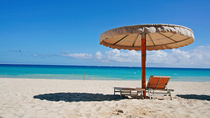 lounge chairs on the beach