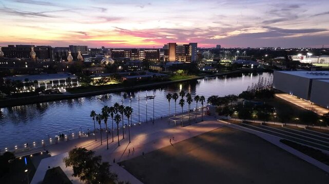 Curtis Hixon Park At Tampa Florida United States. Drone Captures A Garden With Sidewalks Surrounded By Lush Trees. Building Industry Skyline Commercial Building Beautiful. Sunset. Tampa Florida.