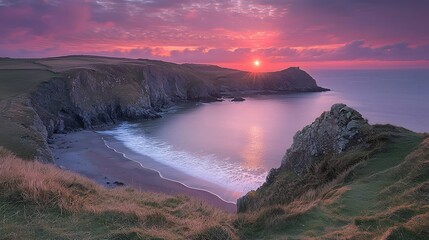 Fototapeta premium Breathtaking sunset over a serene coastal landscape with crashing waves rolling onto the shore and dramatic cliffs in the distance creating a picturesque and tranquil scene