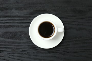 Cup of coffee on wooden background