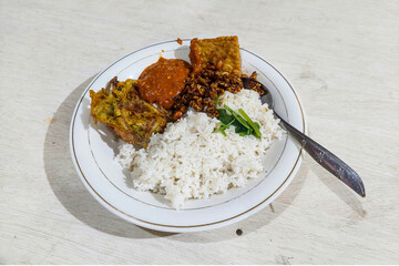 Food Indonesia Mixed rice on a plate at the dining table