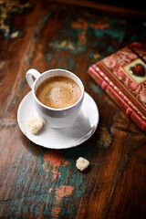 Cup of coffee on wooden background. Soft focus. Copy space