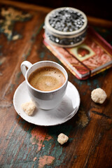 Cup of coffee on wooden background. Soft focus. Copy space