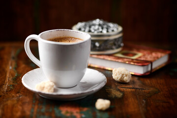 Cup of coffee on wooden background. Soft focus. Copy space