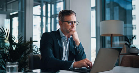 Business, thinking and man with laptop, online reading and internet with problem solving, choice...