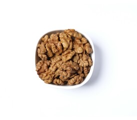 Walnuts in plate isolated on a white background