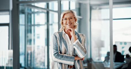 Fototapeta premium Portrait, business and woman in office, smile and expert with confidence, pride and career ambition. Job success, face and mature person in workplace, human resources and CFO with experience