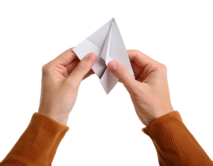 Close up of hands are folding to make a paper airplane isolated on transparent background