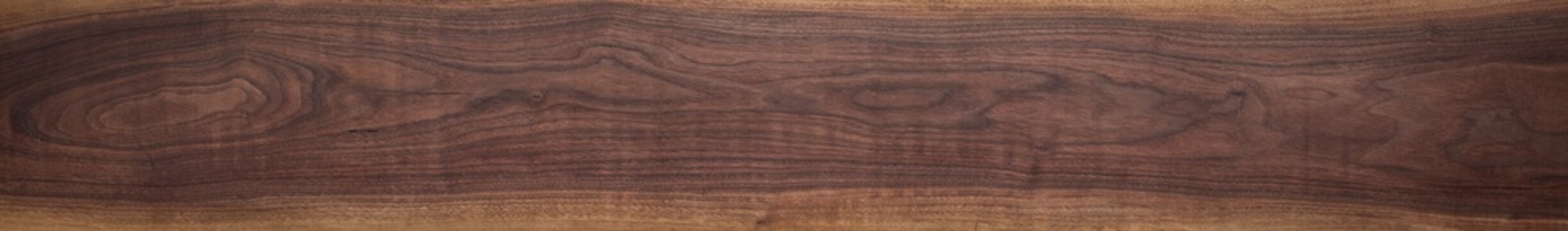 Walnut wood texture. Super long walnut planks texture background.Texture element