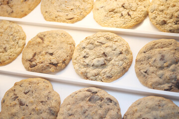 Delicious freshly baked cookies on display in a bakery