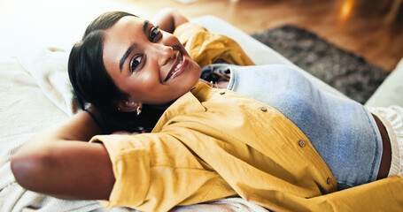 Woman, portrait and rest in home with smile, comfort and weekend chill in lounge. Girl, happy and...