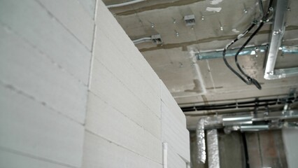 Stacked aac blocks forming a wall during building construction