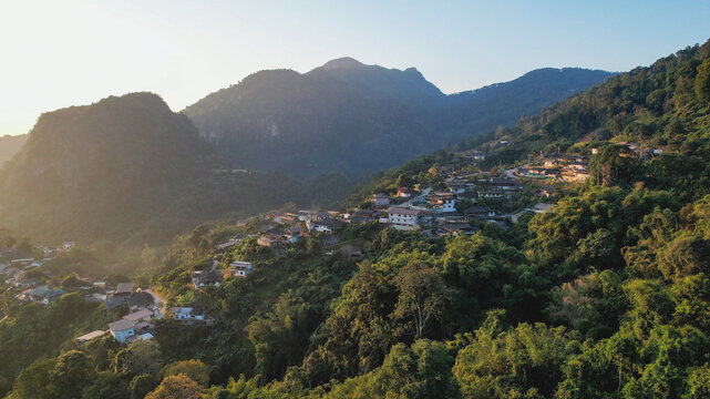Aerial view from drone of the rural village in the mountains before sunrise