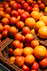Pile of ripe sicilian oranges at market as background.