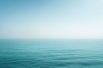 Obraz premium Calm ocean horizon with soft blue tones