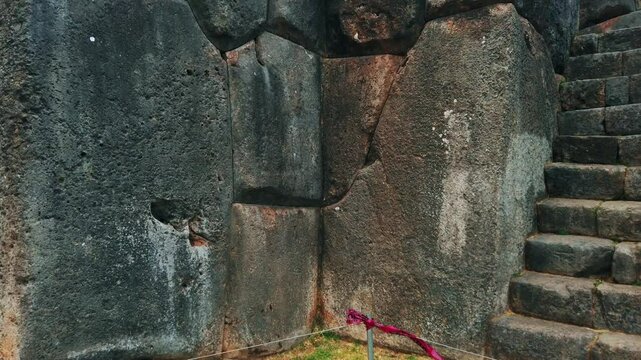 Close up view of massive stone walls at Sacsayhuam&aacute;n, famous archaeological site in Cusco, Peru