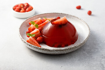 Homemade strawberry jelly with fresh berries