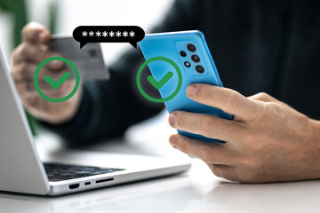 Man using credit card, paying via mobile banking app. 2FA payment, two factor authentication concept