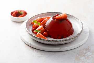 Homemade strawberry jelly with fresh berries