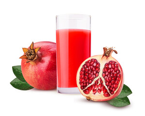 Glass of freshly squeezed pomegranate juice and pomegranate one cut in half with green leaf