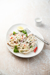 Squid salad with chili and cilantro