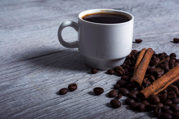 Close up cup of coffee and beans