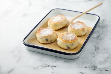 Homemade curd cakes with icing sugar