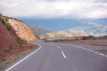 Asphalt road. Landscape with beautiful winding mountain road