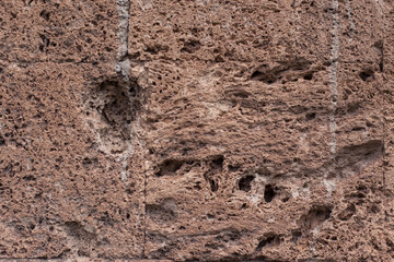 Old brick wall, laterite stone surface