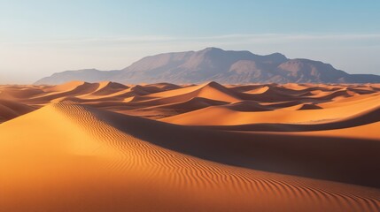 Naklejka premium A sweeping desert view with endless dunes showcasing fine, colorful sand textures.