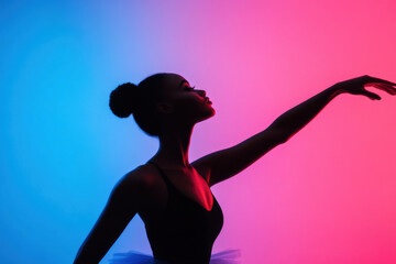 Graceful ballerina performing with expressive movement in neon lights
