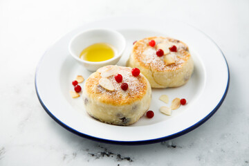 Homemade curd cakes with honey and almond